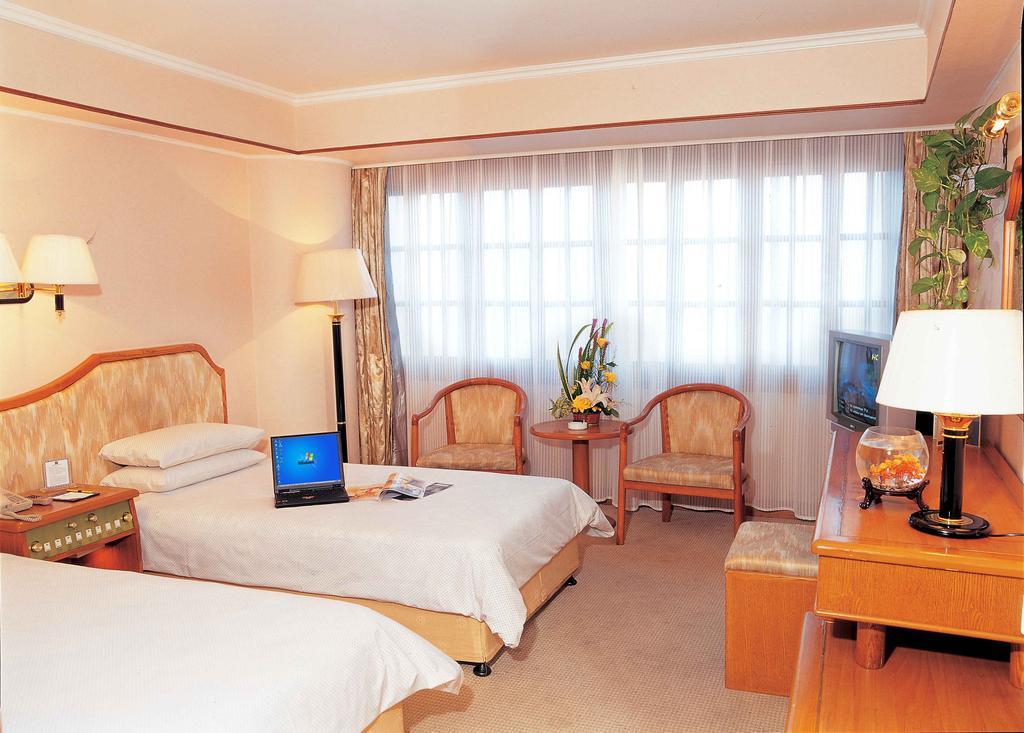 Enjoyor Hotel Hangzhou Kamer foto